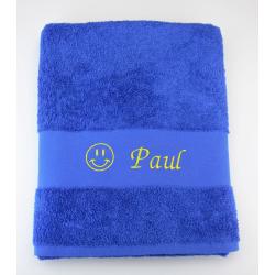 Drap de bain personnalisé avec smiley (bleu roi brodé jaune)